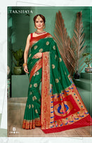 Takshaya Devika Pathani Dola Silk Festive Wear Saree Catalog Collection